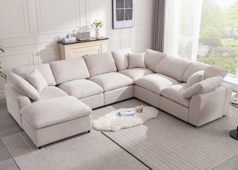 A modern modular sectional sofa in a spacious living room, featuring a sleek design and plush cushions for maximum comfort.